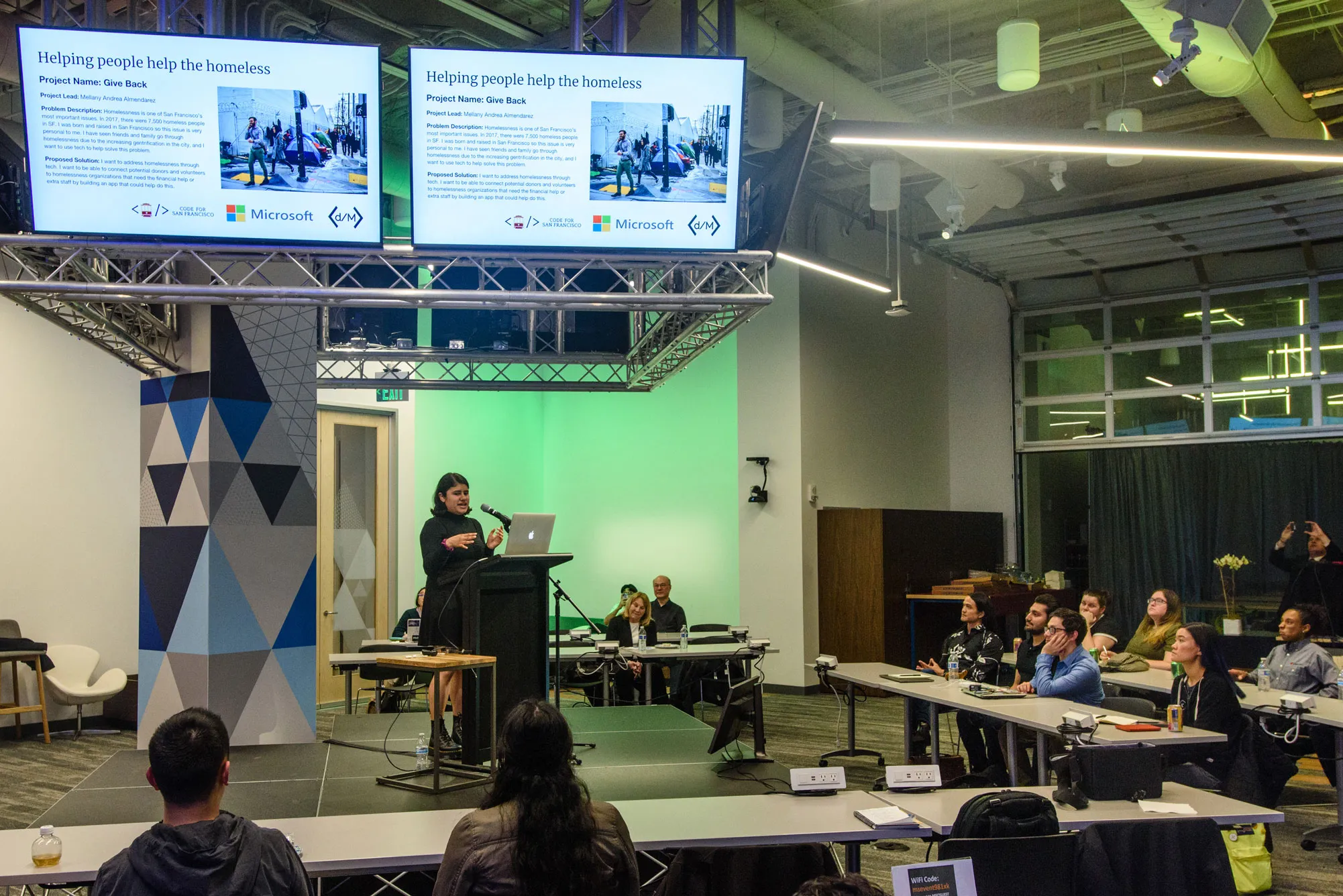Mellany presents her Fellowship project at Microsoft&#x27;s Reactor event space.
